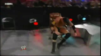 John Cena throws Wade Barrett through the Steel Steps