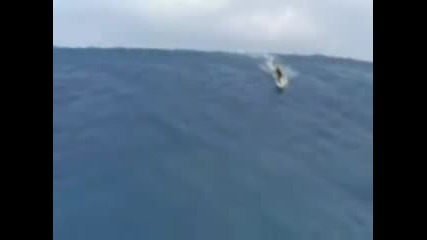 Сърфист Язди Цунами