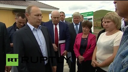 Russia: Putin meets with Khakassian fire victims during flying visit