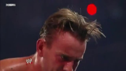 Madness Elbow Drop through the announcer table