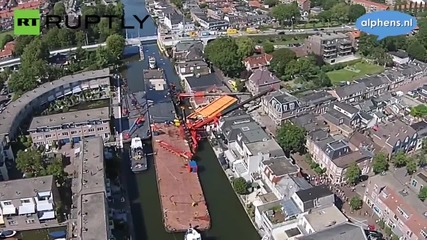 Twenty injured as Homes crushed by falling cranes in Holland