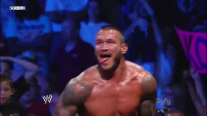 Randy Orton Rkos R-truth on the announcer table