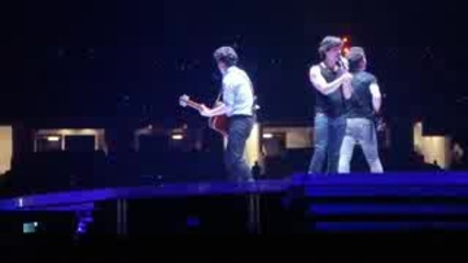 Lovebug - Jonas Brothers - Joe walks through water screen