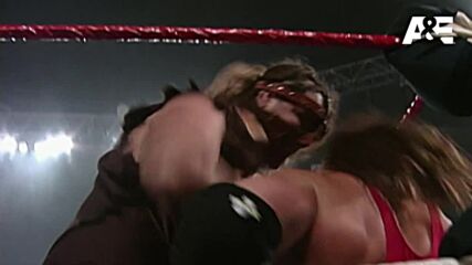 Triple H and Mick Foley tear each other to shreds in a barbaric rivalry: A&E WWE Rivals: Triple H vs. Mick Foley