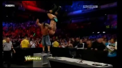 Wwe John Cena Fu Batista through the announce table