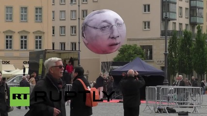 Germany: NGO slams G7's 'hot air' with these super-size balloons!