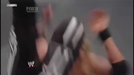 Kane reverses a Spear into a Big Boot