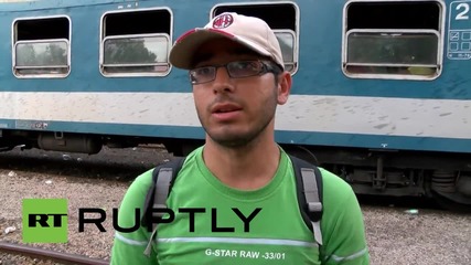 Hungary: Hundreds of refugees depart Roszke on board Austria-bound train