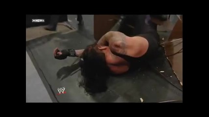 Edge throws Undertaker through 3 Tables