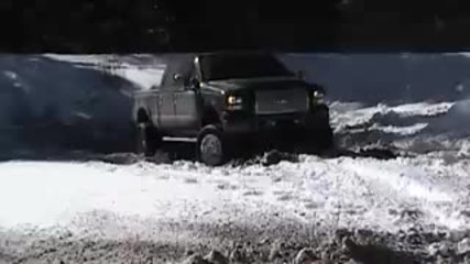 Ford f - 250 turbo diesel playing in the snow 