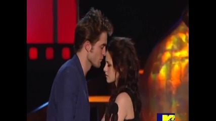 Rob and Kristen almost kiss. 