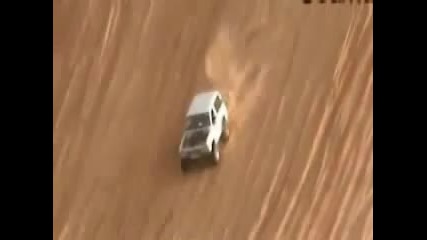 1000 hp Nissan Patrol climbing a mega - dune 