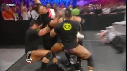 Randy Orton throws Alex Riley on the Nexus