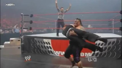 Umaga - Swining Side Slam on the Floor