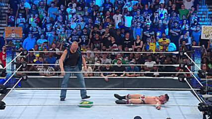 Brock Lesnar pummels Theory with the Money in the Bank briefcase