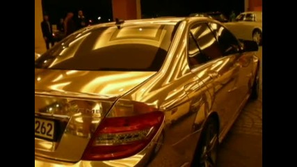 Two Golden Mercedes Amg Cars