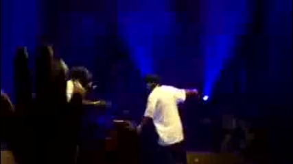 Ronaldinho and 50 Cent on stage dancing