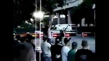 Crazy Guy Doing A Back Flip On A Street Bike.