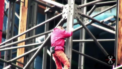 The French Spiderman Alain Robert climbs the Pompidou center 