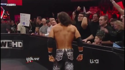 John Morrison - Jumping Knee Strike in opponent on the Barricade