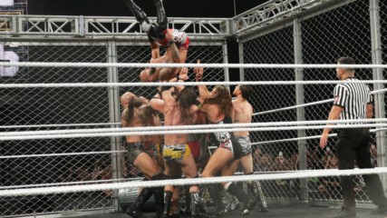 Ricochet connects with an insane double Moonsault from the top of the WarGames Cage: NXT Takeover: WarGames II (WWE Netw