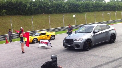 Bmw X6m vs Lotus Elise