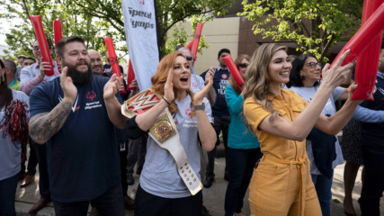 Becky Lynch leads a cheer for the Special Olympics Connecticut Law Enforcement Torch Run at WWE Headquarters