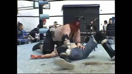 Mad Man Pondo - Avalanche Fireman's Carry through a Glass