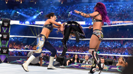 Bayley and Sasha Banks team up to eliminate multiple foes in the first-ever WrestleMania Women's Battle Royal Match: Wre