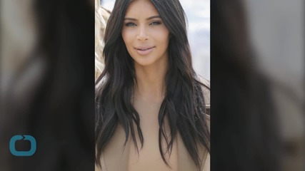 Kim Kardashian Bares Crazy Cleavage in Paris With Kanye West--Are The Wests Renewing Their Vows?