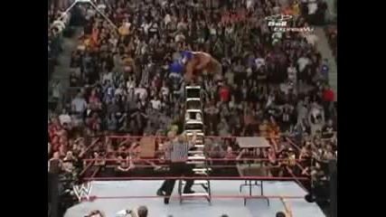 John Cena Fu s Edge through two Tables from a Tall Ladder