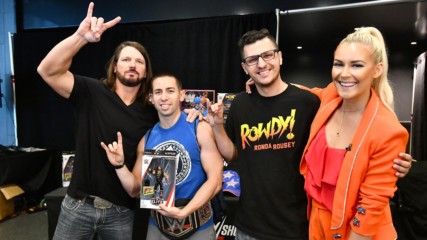 AJ Styles and Renee Young surprise two WWE action figure collectors at SummerSlam
