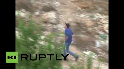 State of Palestine: Israelis throw rocks at Palestinians during day of violent clashes in Hebron