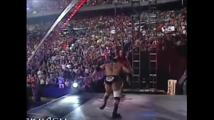 Batista spears Undertaker off the entrance stage