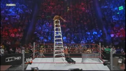 Rey Mysterio throws Alberto Del Rio off a Ladder throught a Table