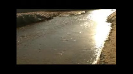 По реката