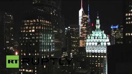 USA: Freedom Tower lit in red, white and blue in solidarity with France