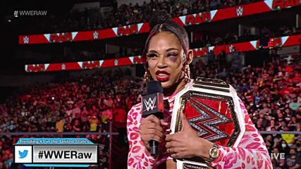 Bianca Belair celebrates winning the Raw Women’s Title at WrestleMania: Raw, April 4, 2022