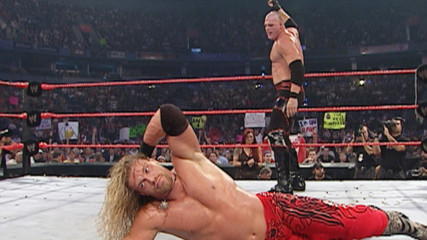 A sneak attack from another Superstar helps Edge take down Kane: Raw, Aug. 16, 2004