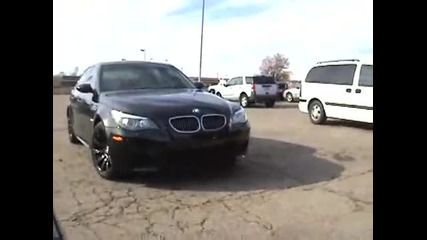 Jorge Gurgel s blacked out Bmw M5 with custom plates parked 