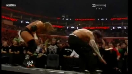 Edge Spears Jeff Hardy into the Announcer Table