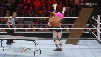 Sheamus White Noises Damien Sandow through a table on the corner