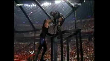 Taker Chokeslaming M.v.p on top of the chamber 