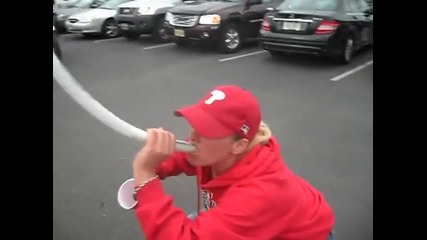 Girl drinking Beer Bong at Phillies game,gets high-5 from cops