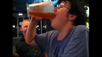 Travis_drinks_jug_of_beer_in_4_s