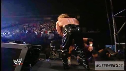 Jackknife Powerbomb On Triple H Through Announcer Table Hd