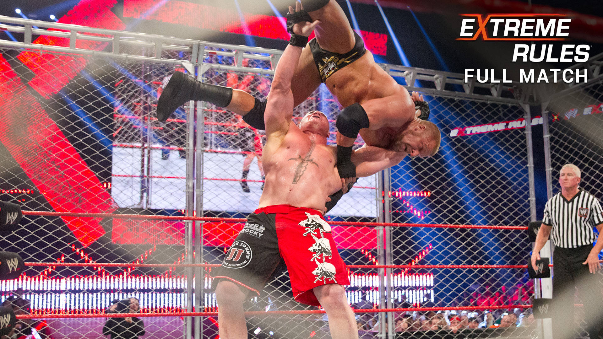 Трите Хикса срещу Брок Леснър в метална клетка: Extreme Rules 2013