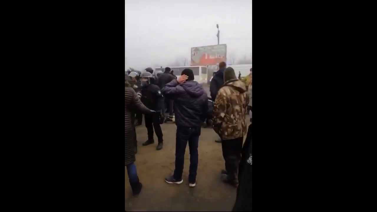 Ukraine: Police detain protesters as dozens demonstrate against housing of Wuhan evacuees