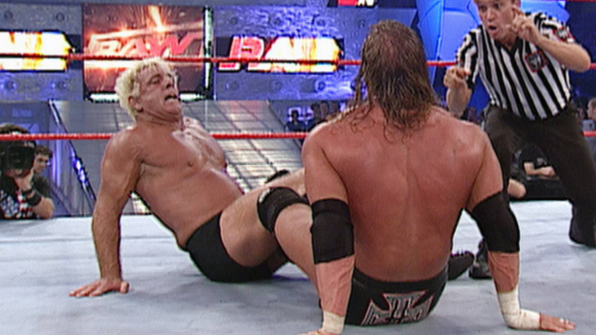 Рик Флеър vs. Трите Хикса - Мач за Световната титла: Първична сила, 2 Септември, 2002