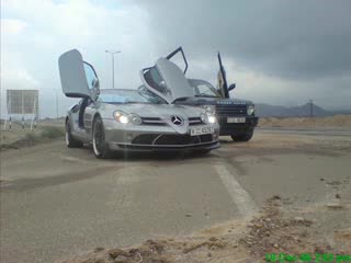 Mercedes Slr And Land Rover Range Rover